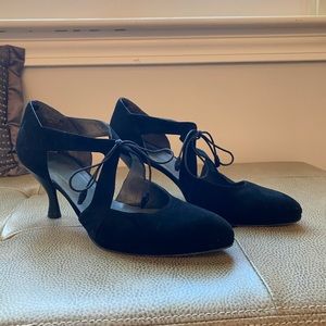 Black suede heels with tie.